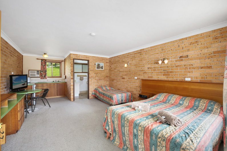 River View room with queen bed, kitchenette and garden outlook